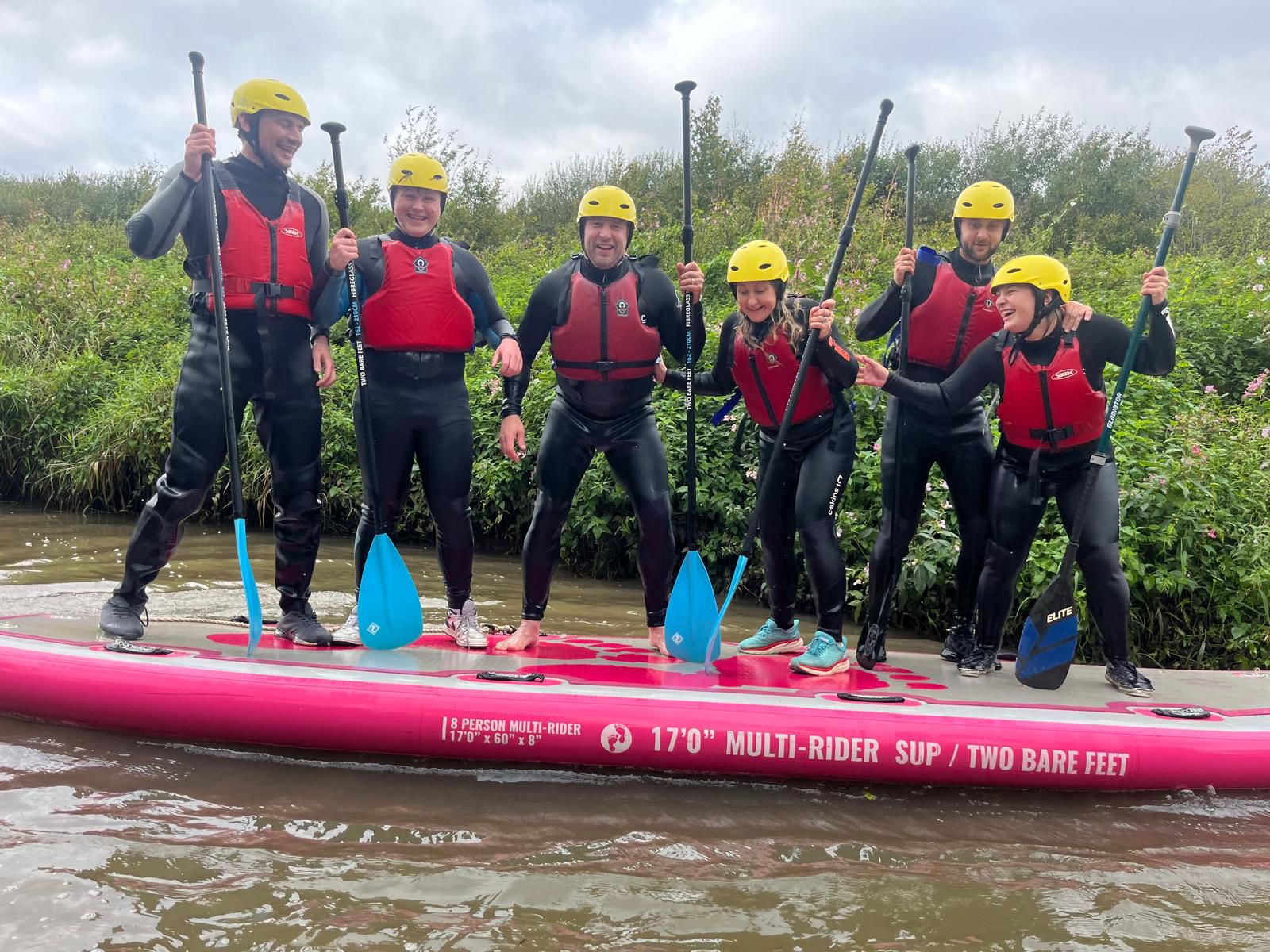 Staff from the Halt paddleboarding